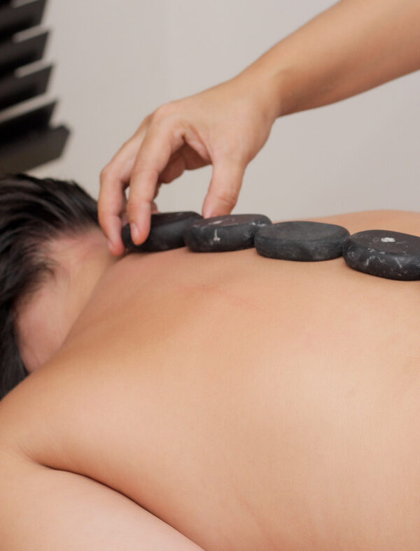 Masaje con Piedras Calientes